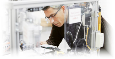 engineer checking machine bboard back