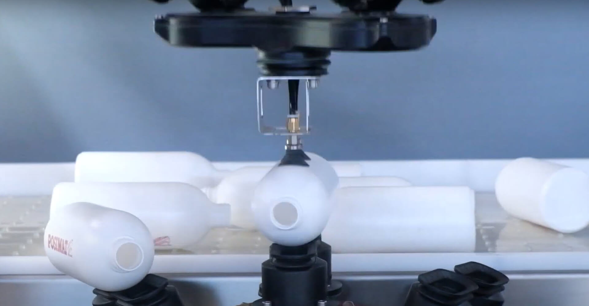 Robotic bottle unscrambler from POSIMAT provides a solution to constant